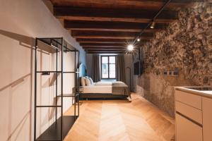 Ein Bett oder Betten in einem Zimmer der Unterkunft H5 Grauer Bär Studios & More