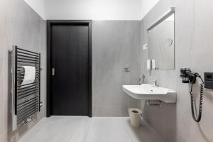 Koupelna v ubytování Theresian Hotel