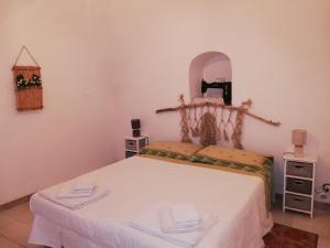 Posteľ alebo postele v izbe v ubytovaní Ciao b&b