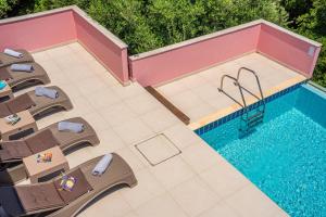 The swimming pool at or close to Villa Helios Sea View & Private Pool near Fiskardo