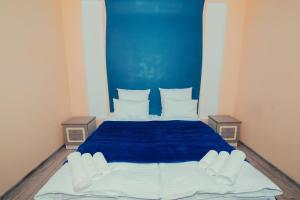 Ένα ή περισσότερα κρεβάτια σε δωμάτιο στο VN Hotel Vanadzor