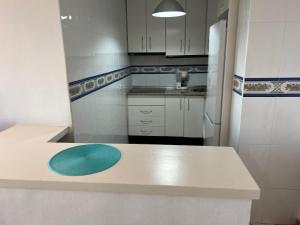 Kuchyň nebo kuchyňský kout v ubytování Apartamento con terraza y piscina - Todoholiday