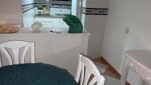 Kuchyň nebo kuchyňský kout v ubytování Apartamento con terraza y piscina - Todoholiday