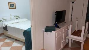 Postel nebo postele na pokoji v ubytování Apartamento con terraza y piscina - Todoholiday