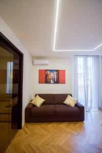 Ruang duduk di SiBilla Suite Apartment - via Piella 14