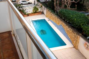 Bazén v ubytování AT099 Con piscina, a tan solo 600m de la playa la Paella nebo v jeho okolí