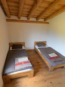 Postel nebo postele na pokoji v ubytování Alphütte mit Halbpension