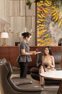 Hosté ubytování New Orient Hotel Da Nang + 37 fotografií