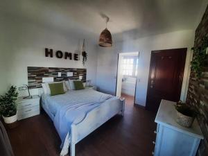 Postel nebo postele na pokoji v ubytování Casa Joy