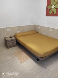 Posteľ alebo postele v izbe v ubytovaní Alojamientos playa Centro Corralejo 8