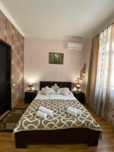 Postel nebo postele na pokoji v ubytování Guest house Lusia