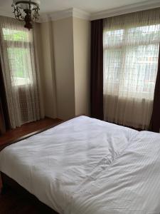Postel nebo postele na pokoji v ubytování esa suite