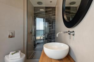 Koupelna v ubytování Hotel Ideon