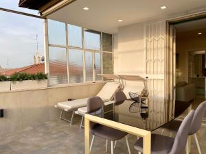 A seating area at Le Suite con terrazzo Abitare Roma