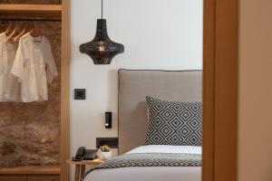 Postel nebo postele na pokoji v ubytování Hotel Ideon