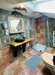 a bathroom with a sink and a shower at Rooms Murka in Bled
