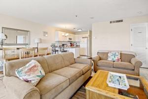 a living room with a couch and a table at Myrtle Beach Resort T1601 in Myrtle Beach