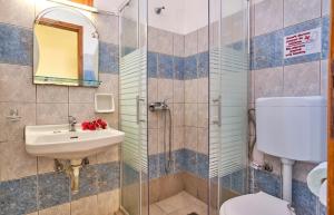 Koupelna v ubytování Hotel Olga