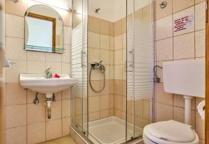 Koupelna v ubytování Hotel Olga + 35 fotografií