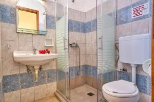 Koupelna v ubytování Hotel Olga