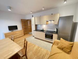 Кухня или мини-кухня в Apartament Park Zakrzowek

