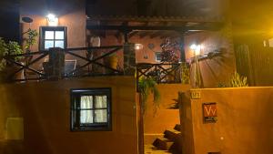 a room with a door and a window in a building at Casa Moni con Vistas al Mar in Playa de Santiago