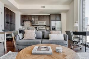 a living room with a couch and a table at Downtown Austin 1br w gym pool wd nr Capitol ATX-165 in Austin