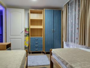 Ένα ή περισσότερα κρεβάτια σε δωμάτιο στο D&M Apartman Dojkinci