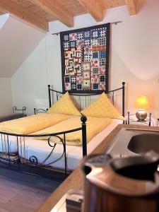 Postel nebo postele na pokoji v ubytování Sunhill Appartments, klimatisiert