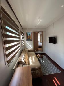 A television and/or entertainment centre at PALMERA ART HOUSE
