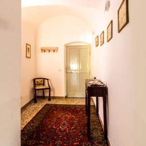 Postel nebo postele na pokoji v ubytování La Semplicità del Borgo
