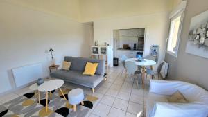 Χώρος καθιστικού στο Appartement 2 Chambres "Le Moulin"