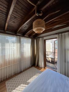A bed or beds in a room at PALMERA ART HOUSE