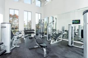 a gym with several treadmills and cardio machines at Santa Clara 1BR w Parking Pool nr Dining SFO-411 in Santa Clara
