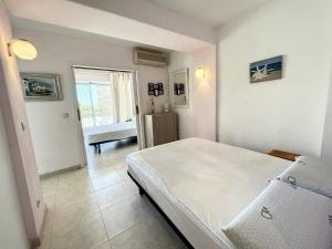 Posteľ alebo postele v izbe v ubytovaní Isla de Roses 1-24
