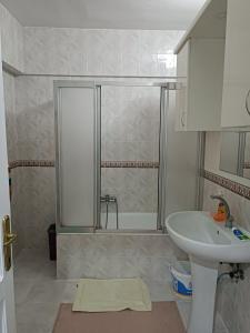 a bathroom with a shower and a sink at hamdihome in Akcaabat