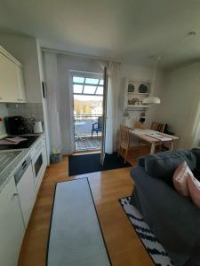 Kuchyň nebo kuchyňský kout v ubytování Apartment Vier Jahreszeiten