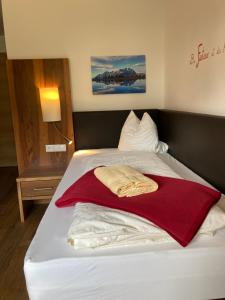 Postel nebo postele na pokoji v ubytování Skirast - Kirchberg
