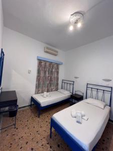Postel nebo postele na pokoji v ubytování Project Town