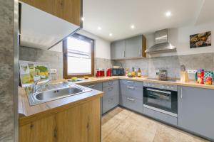 Kuchyň nebo kuchyňský kout v ubytování Ferienhaus Andrea + 22 fotografií