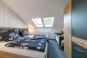 Postel nebo postele na pokoji v ubytování Ferienhaus Andrea