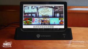 a laptop computer sitting on top of a table at Hotel-Restaurant Schmachtenbergshof in Essen