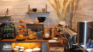 a kitchen with a counter with food on it at Hotel-Restaurant Schmachtenbergshof in Essen