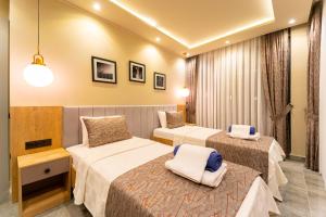 Postel nebo postele na pokoji v ubytování Villa Simurg + 37 fotografií