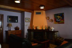 TV a/nebo společenská místnost v ubytování Hostal l'Escon
