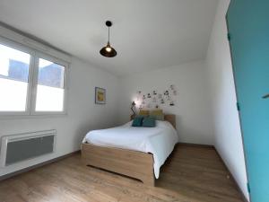 Postel nebo postele na pokoji v ubytování Tout Inclus - Plein Centre - Netflix - Moontown