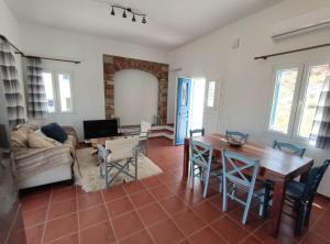 A seating area at Lighthouse View Syros