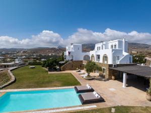 an image of a villa with a swimming pool at Villa Ainar in Tinos