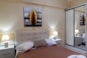 Postel nebo postele na pokoji v ubytování Comfort House Mimosa 1