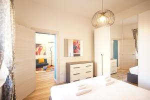Uma cama ou camas num quarto em Truly Verona